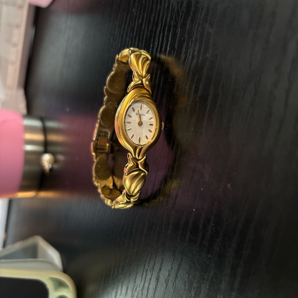 Gold Bulova watch